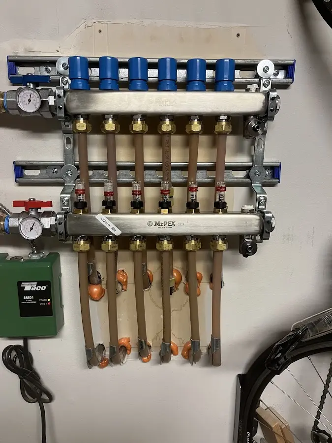 Plumber performing Water Heater Repair at a residential property in Independence